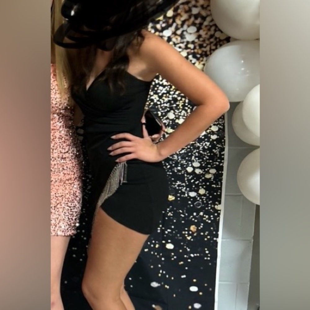 Mini/midlength Black party, formal, or homecoming dress with silver blingfringe.
